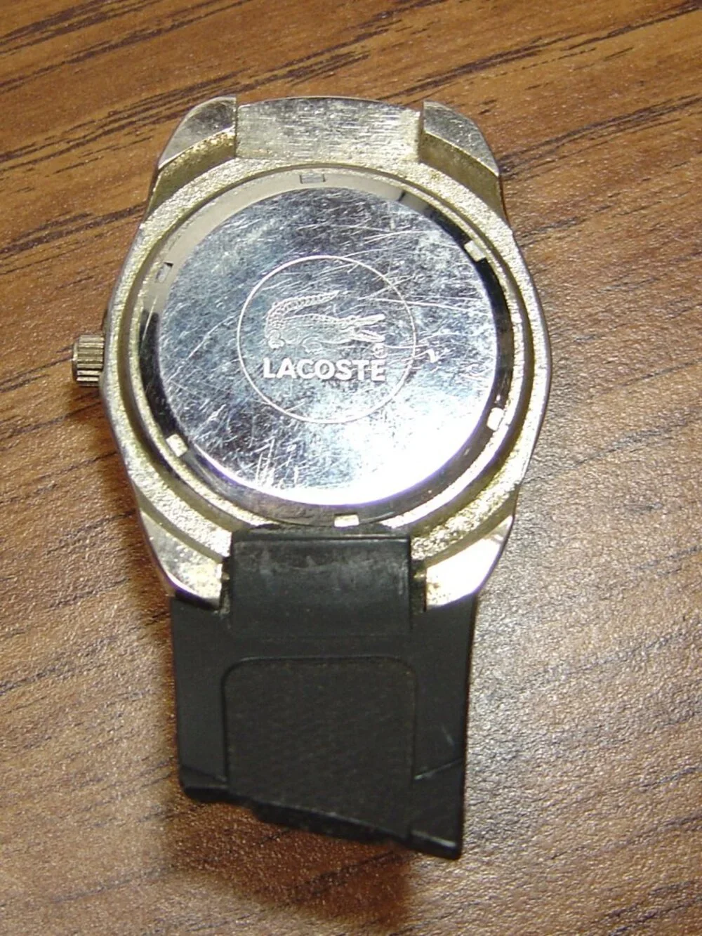 Men's Lacoste quartz watch-red dial-alligator design on dial-needs a band